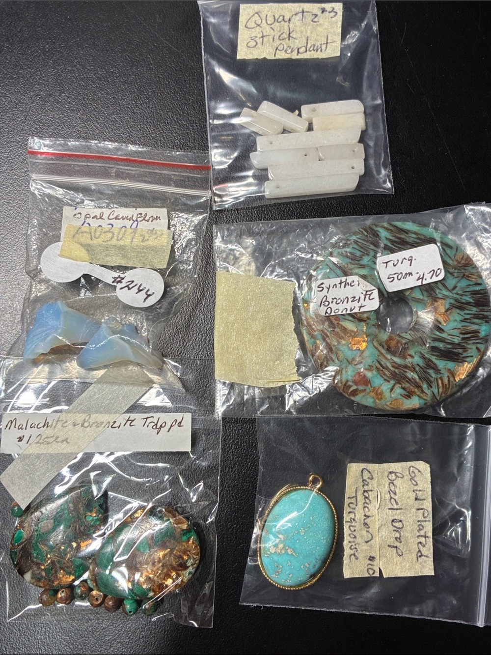 Mixed lot of gemstone pendants and pendant beads